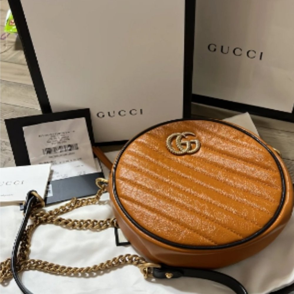 Gucci cross body brown bag